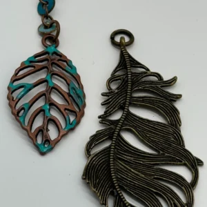 A close up of two different types of metal jewelry