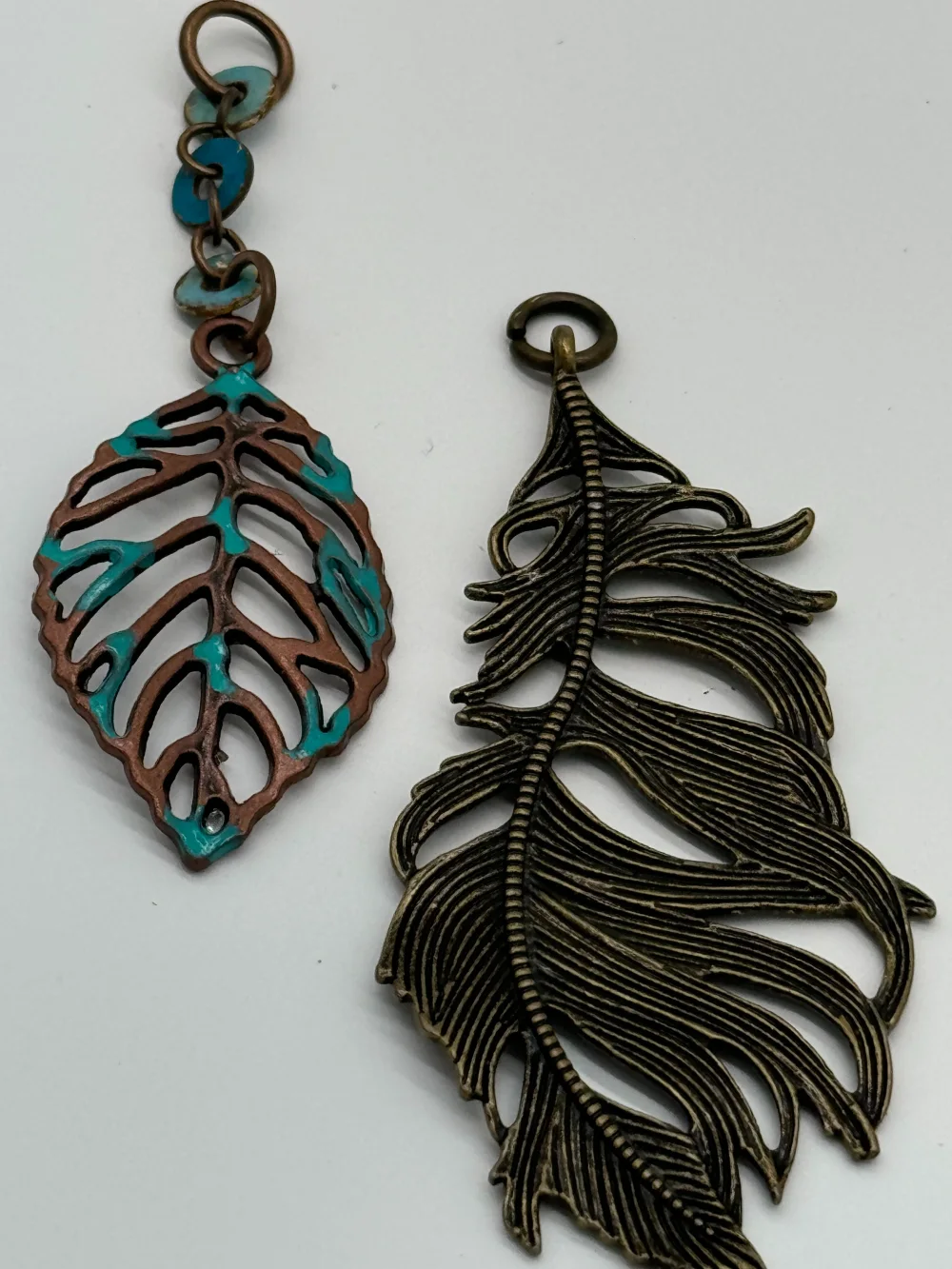 A close up of two different types of metal jewelry