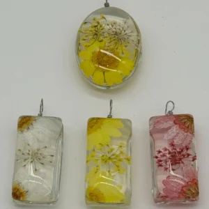 A group of four different types of flowers.
