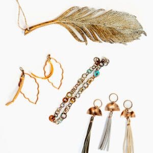 A close up of some jewelry on a white surface