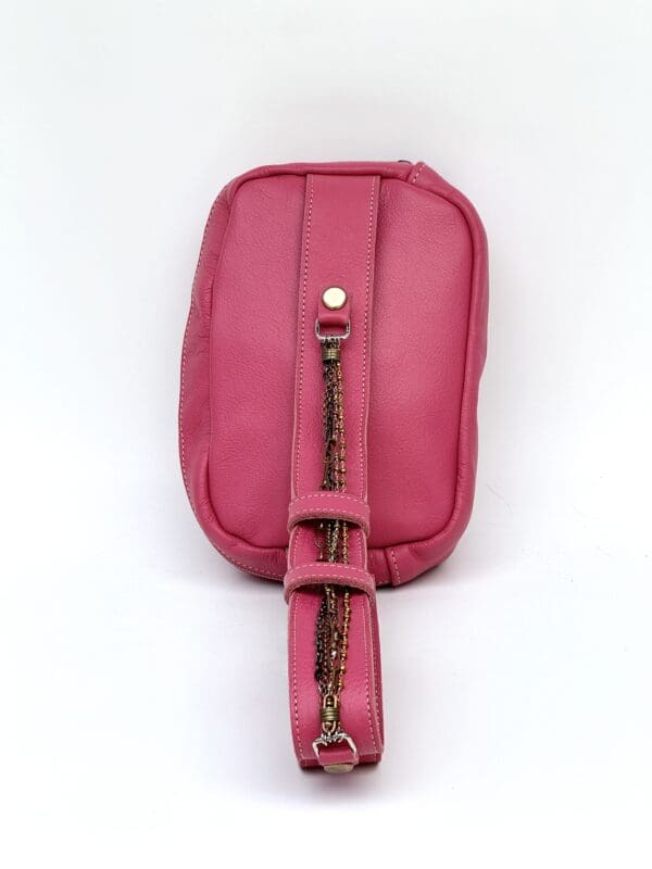 A pink purse with a chain strap and a zipper.