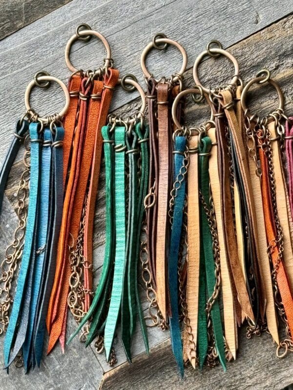 A bunch of different colored leather key chains