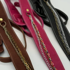 A group of scissors with different colored handles.